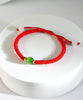 8mm Siberian Chatoyant Jade Red Cord Bracelet #1327