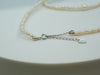 Solid 925 sterling silver tarnish resistant clasp detail on freshwater pearl necklace