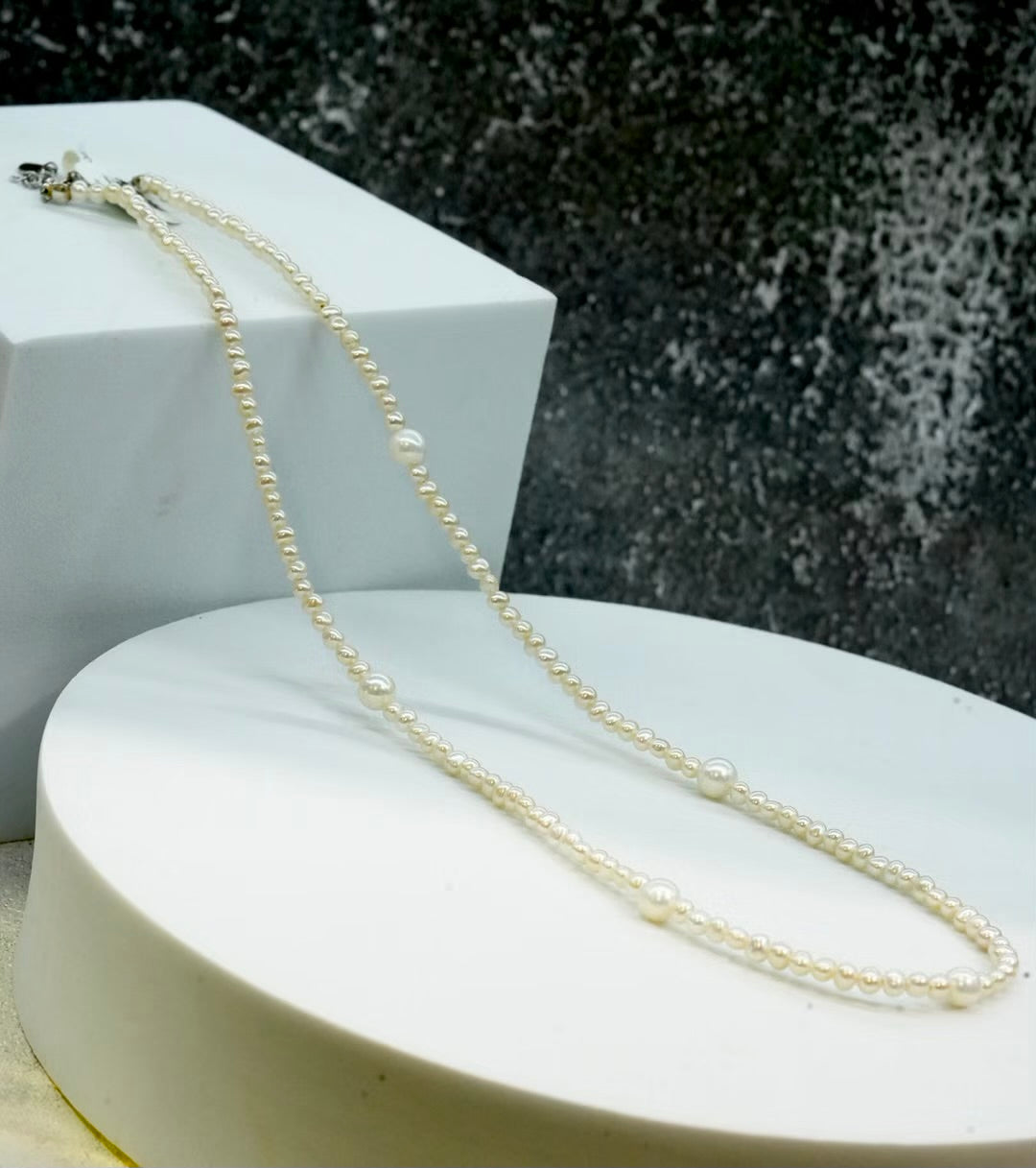 High luster white freshwater cultured rice pearls showing mirror reflections
