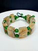 Handmade Gold Rutilated Quartz and Nephrite Jade beaded bracelet by Natural Gems Canada, showing genuine golden titanium crystal inclusions. Natural Gems Canada 手工天然金发晶和田玉碧玉手串，展现清晰的钛晶猫眼发丝。