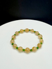 Round rutilated gold quartz jade bracelet