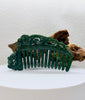 Green Nephrite Jade Hair Comb on stand with phoenix and dragon carvings