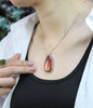 Whole piece of Canadian ammolite stone. Color changing from red to green, high flash red color.