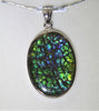 Canadian Ammolite pendant, color changes from different points of view!